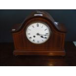 An Edwardian mahogany mantle clock, the