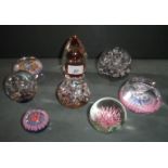Eight paperweights, including a 1977 Whi