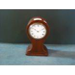 An Edwardian mahogany mantle timepiece,