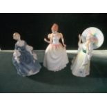Three Royal Doulton figures, including J