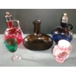 A Victorian cranberry glass carafe of gl