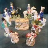 Nine reproduction Staffordshire figures,