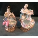 Two Continental porcelain spill holders,