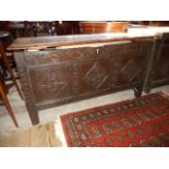 An 18th century oak coffer, the rising l