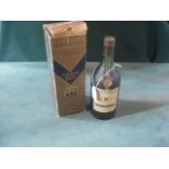 A cased bottle of Martell Cordon Bleu Cognac.