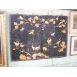 A four fold Chinese screen applied with faux mother of pearl cranes on a black ground.