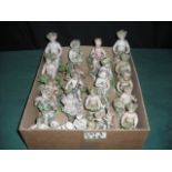 A group of sixteen putto figures by Derby and other factories, including some Staffordshire,