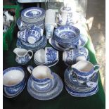 An extensive part 'Old Willow' blue and white transfer printed tea and dinner service and various