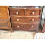 A Regency mahogany bow fronted chest of two graduated long and two short drawers on swept bracket