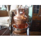 A 19th century copper dairy jug and a similar two handled preserving pan.