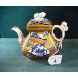 A Coalport Aesthetic Movement teapot, transfer printed in blue and white with fans and other