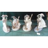 A group of four Lladro figures forming a female quartet, maximum height 25cm.