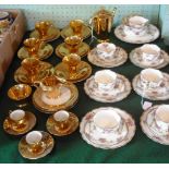 A six setting part-tea set, transfer printed and painted with flowers, a gilt six setting part-tea