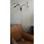A 1960's two branch standard lamp with brushed metal shades.