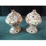 A pair of Worcester-style pot pourri vases and covers of baluster form, 29cm high.