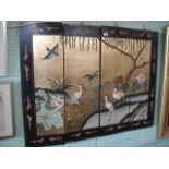 A four-fold Chinese screen, decorated with cranes on a gilt ground.