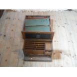 A Victorian oak stationery box and an early 19th century brass bound mahogany writing slope. both
