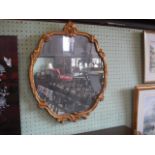 Gilt framed round mirror.