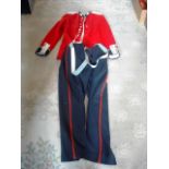 A Grenadier Guards mess jacket, red with