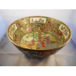 A modern Chinese Famille rose bowl with gilt rim,