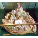 A Lilliput Lane 'Out of the Storm' model in original glass display case,