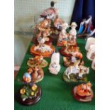 A collection of twelve figures and figure groups,