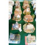 A collection of twelve Lilliput Lane model cottages, all with original deeds,