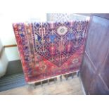 A Bakhtiar Persian carpet, the diamond central lozenge decorated with geometric shapes,