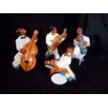 A ceramic four piece jazz band, comprising guitar player, saxophonist,