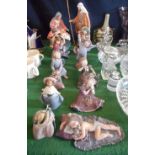 A collection of twelve figurines, to include: Nao, Jesus, Mary and Joseph and others.