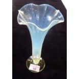 An opalescent trumpet vase with wavy edge rim on circular base, possibly Whitefriars, 22cm.