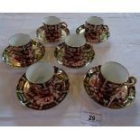 A set of six early 20th century Royal Crown Derby Imari coffee cans and saucers, pattern 2451,