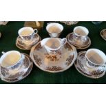 A Colclough bone china part-tea set, number A670, comprising: twelve trios, cream jug,