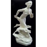 An imposing Art Deco ceramic figure of a nude lady in motion,