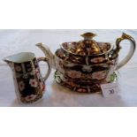 A Royal Crown Derby Imari pattern teapot and stand, early 20th century cypher,