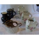 A graduated set of three 19th century jugs in the aesthetic style,