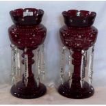 A pair of Victorian cranberry clear glas