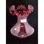 A Victorian cranberry glass vase, the ri