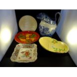 A quantity of ceramics to include: a Poole Delphis shallow bowl,