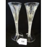 A pair of 18th century trumpet shaped wine glasses,