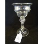 A second quarter 18th century sweet meat glass with ogee bowl on a Silesian stem with cushion foot,