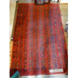 A Turkmen rug formed for longitudinal strips, 170cm x 117cm. Condition Report: -Frayed at edges on