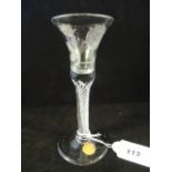 A mid-18th century Jacobite wine glass, the bell shaped bowl engraved with a six petal rose,