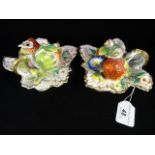 A pair of Staffordshire inkstands, circa 1830, each moulded as strawberries on a leaf shape base,