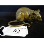 A Japanese Meiji period bronze rat in a crouching position, 7cm long.