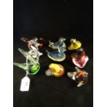 A collection of Continental glass paperweights, each modelled as birds,