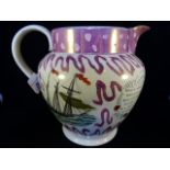 A Sunderland pink lustre jug, decorated with sailing ships and a verse 'To A Friend', 21cm tall.