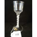 A wine glass with spiral-moulded funnel bowl,