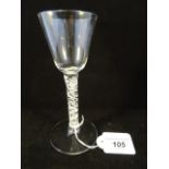 A wine glass with bucket shaped bowl on a stem with opaque spirals, circa 1765,