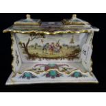 A mid-19th century gilt and painted French porcelain desk stand,